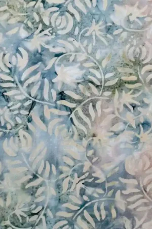Tessuto Batik con rami e foglie beige su sfumature blu rosa e verdi Spedito Oggi